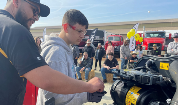 Instructor working with student